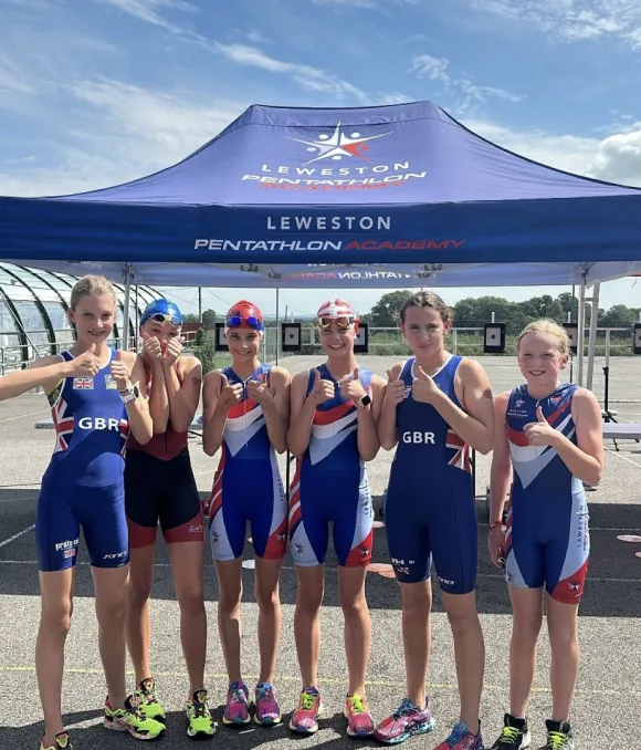 Group of Pentathlon GB athletes posing and giving thumbs up at Leweston Pentathlon Academy